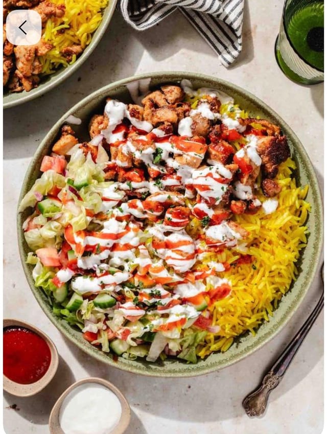 Delco Chicken Over Rice with Chicken Leg.